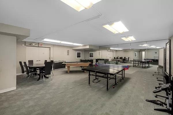 game room with billiards and concrete flooring