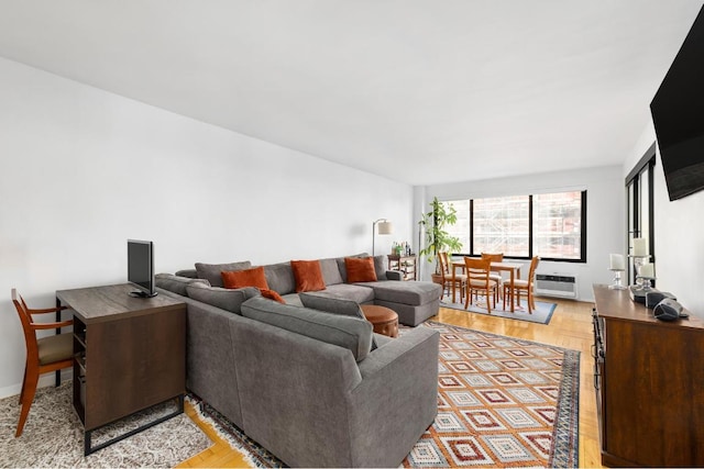 living room with light hardwood / wood-style floors