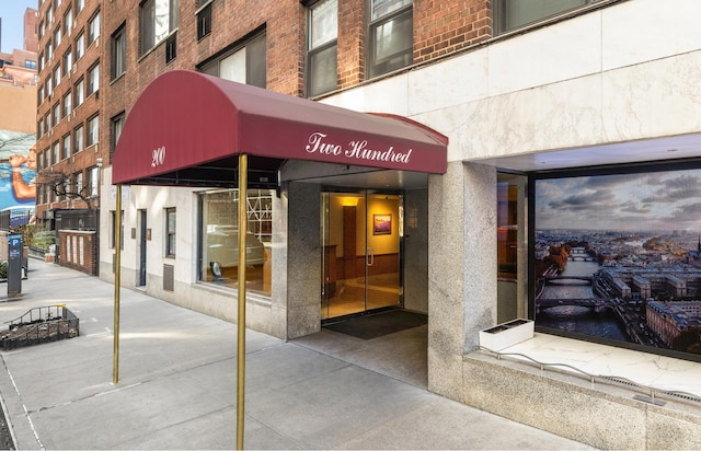200 E 36th St Unit 9D, New York City, NY 10016 - property entrance featuring brick siding