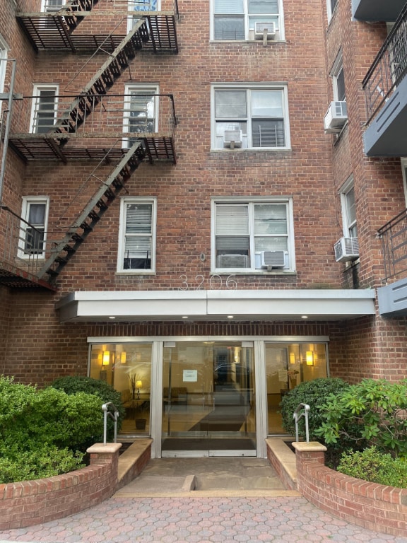 property entrance featuring cooling unit