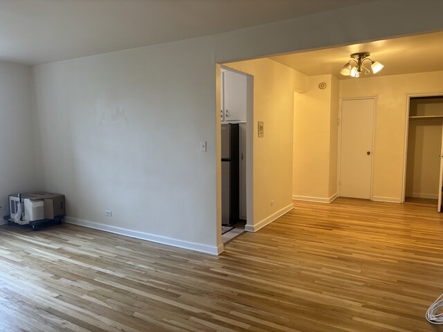 unfurnished room featuring light hardwood / wood-style flooring