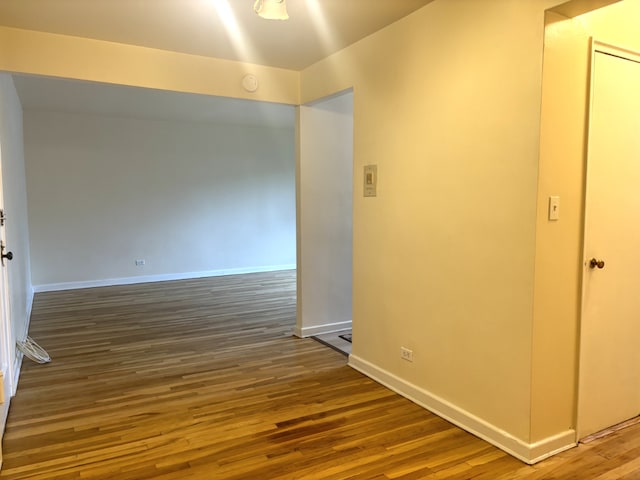 spare room with hardwood / wood-style floors