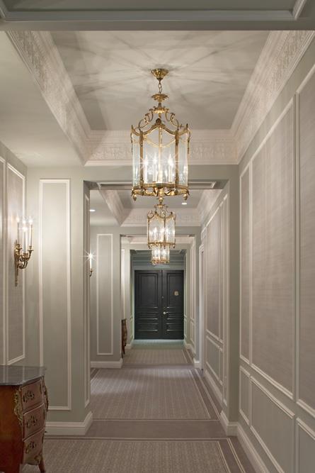 2 E 55th St Unit 901, New York City, NY 10022 - hall featuring an inviting chandelier, crown molding, and carpet floors