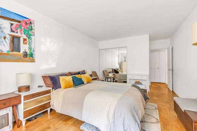 bedroom with light hardwood / wood-style flooring