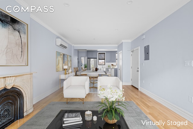 living room with baseboards, light wood-type flooring, ornamental molding, electric panel, and a wall mounted AC