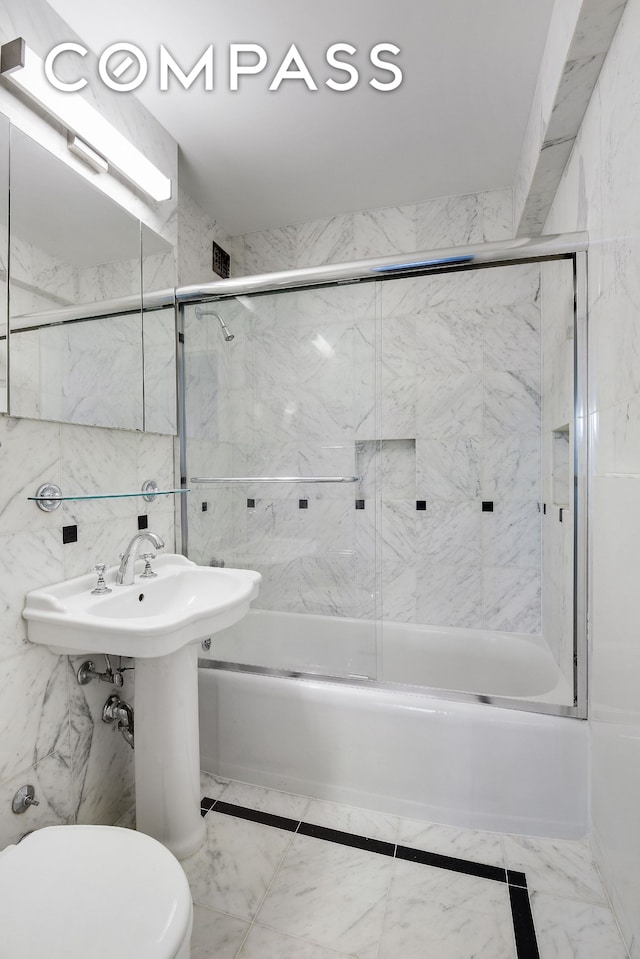 150 E 61st St Unit 5C, New York City, NY 10065 - full bathroom with bath / shower combo with glass door and toilet