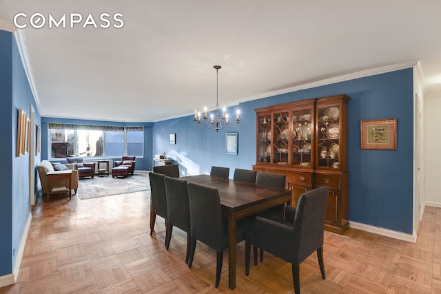 150 E 61st St Unit 5C, New York City, NY 10065 - dining space with baseboards, a chandelier, and crown molding
