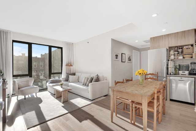 living room featuring light wood-type flooring