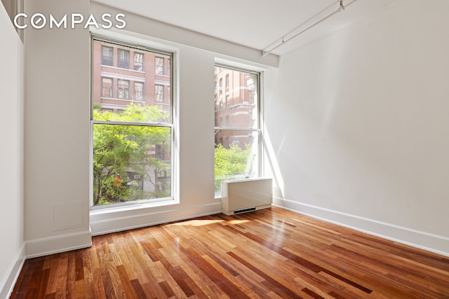 285 Lafayette St Unit 2B, New York City, NY 10012 - unfurnished room with wood finished floors and healthy amount of natural light