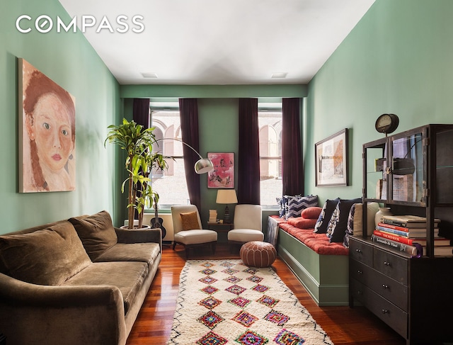 sitting room with wood finished floors