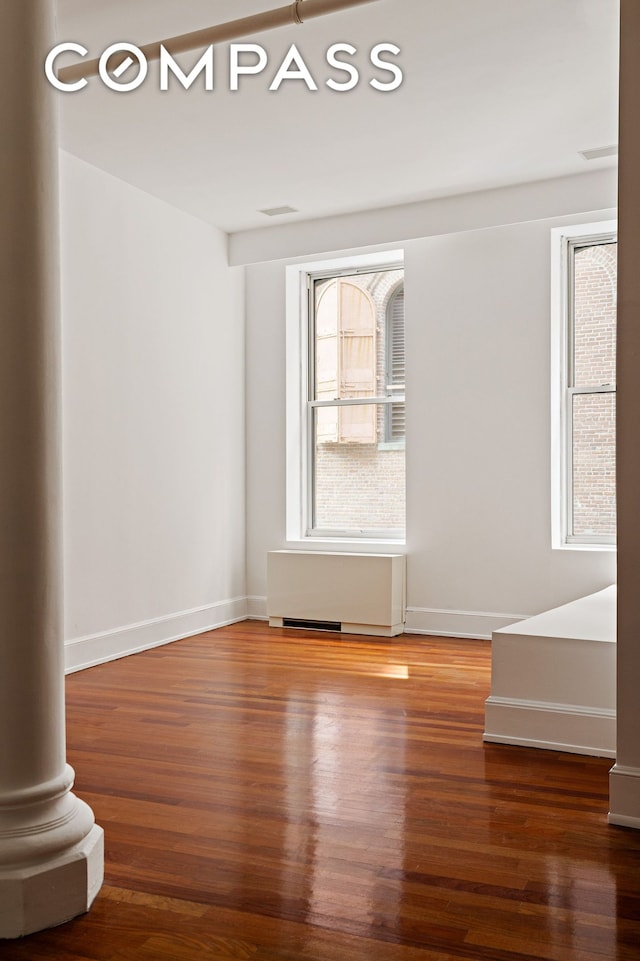 285 Lafayette St Unit 2B, New York City, NY 10012 - unfurnished room featuring wood finished floors and baseboards
