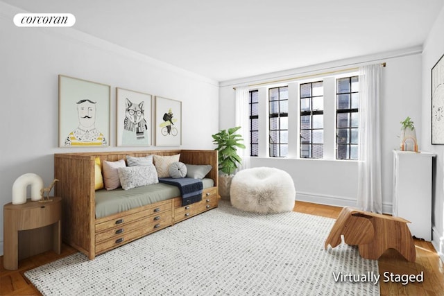 sitting room featuring hardwood / wood-style floors