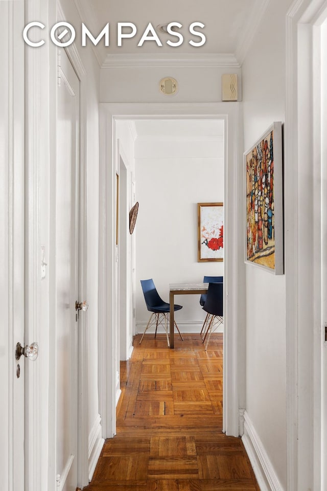 corridor featuring ornamental molding