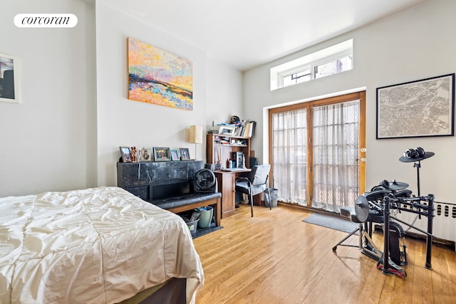 bedroom with wood finished floors