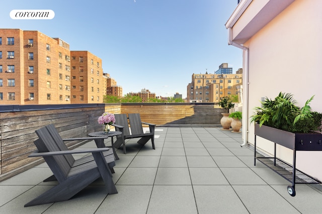 view of patio / terrace with a balcony