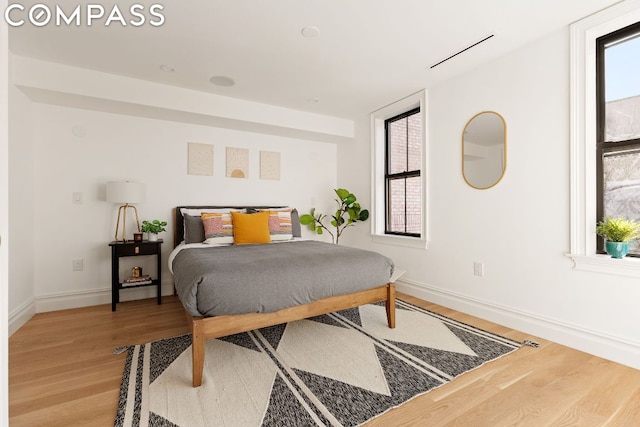 bedroom featuring hardwood / wood-style floors