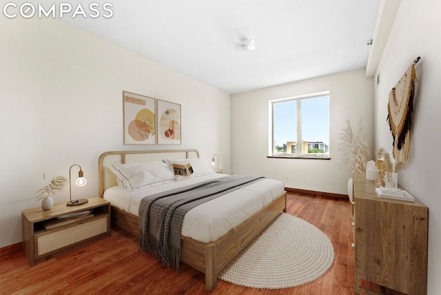 bedroom featuring hardwood / wood-style floors