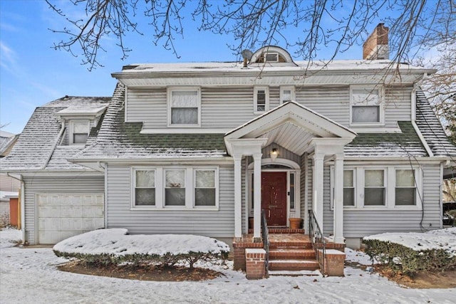 view of front of house with a garage