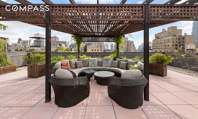 view of patio featuring an outdoor hangout area and a pergola