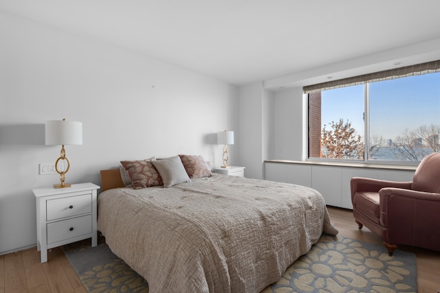 bedroom featuring light wood-type flooring