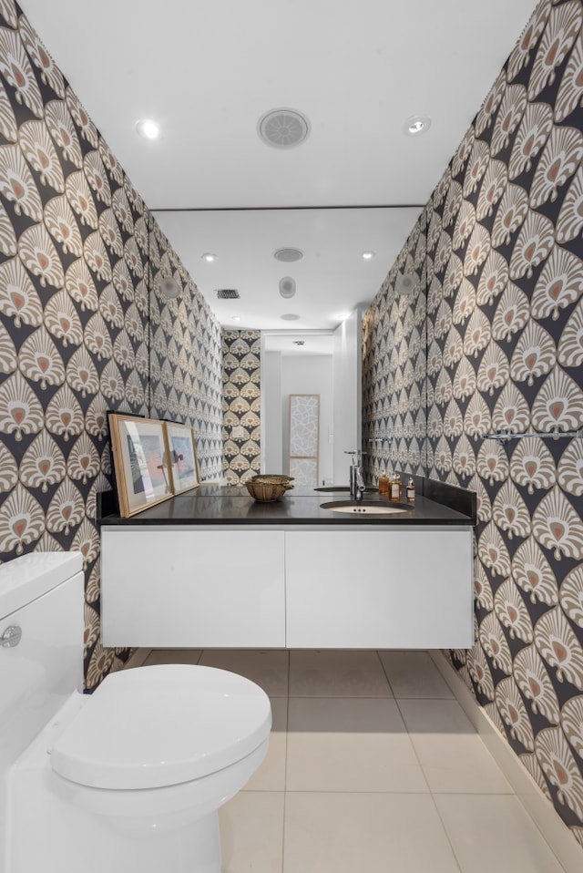 21 S End Ave Unit 321/421, New York City, NY 10280 - bathroom with wallpapered walls, vanity, tile patterned floors, and recessed lighting