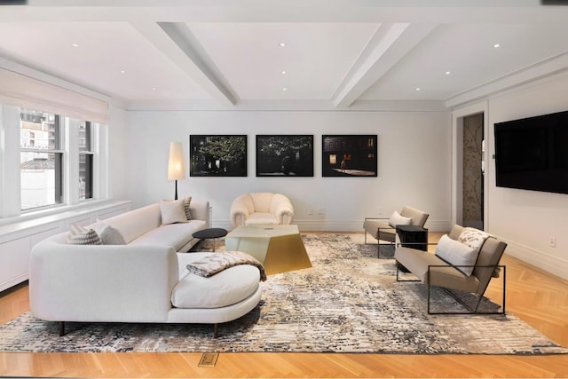 living room with parquet floors and beam ceiling