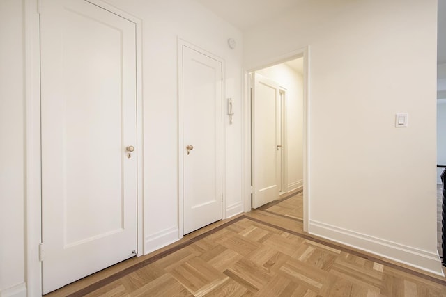 corridor with baseboards