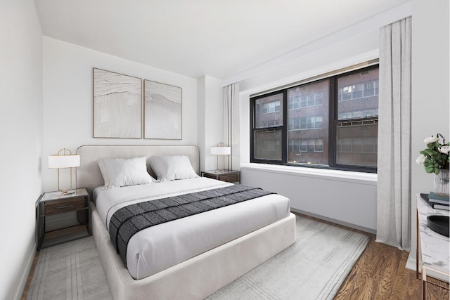 bedroom featuring wood-type flooring