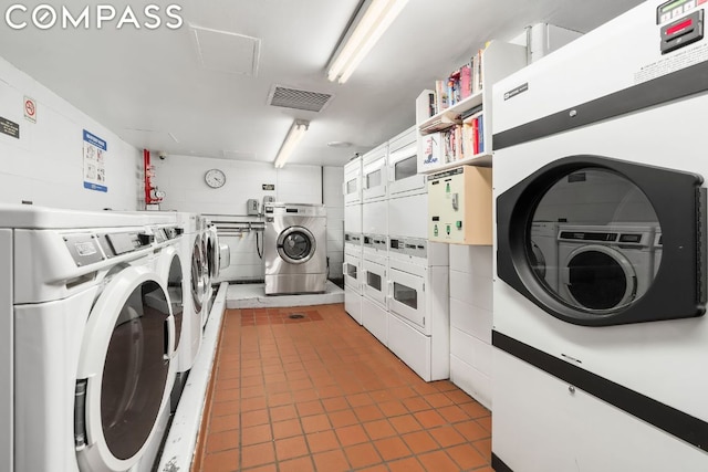 laundry room featuring stacked washer / dryer and independent washer and dryer