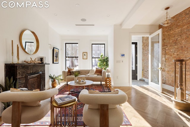 living room featuring light parquet floors