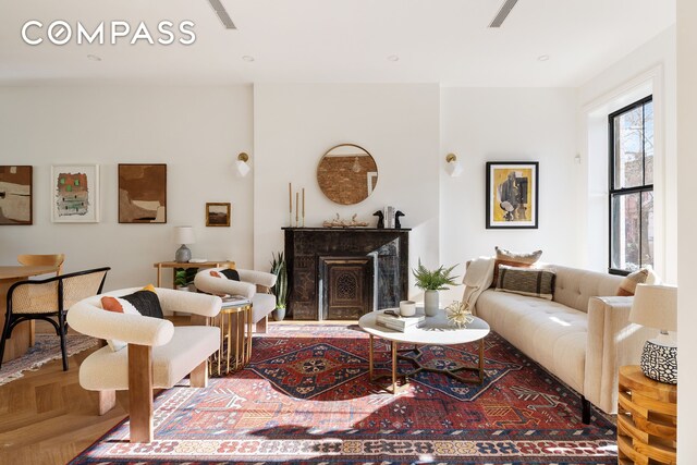 living room featuring parquet floors