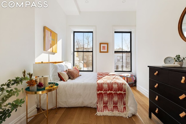 bedroom with light wood-type flooring