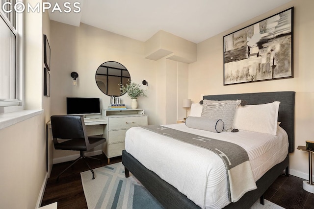 bedroom featuring dark hardwood / wood-style floors