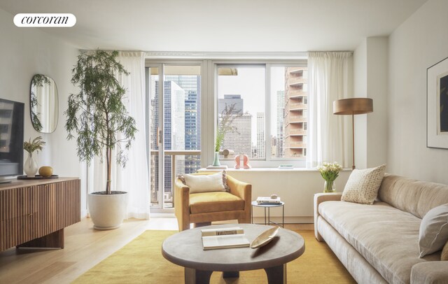 sitting room with light hardwood / wood-style floors