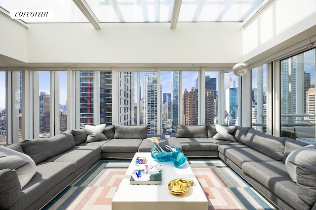 living area featuring a view of city and visible vents