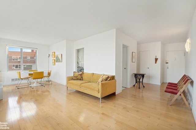 living room with light wood-style floors