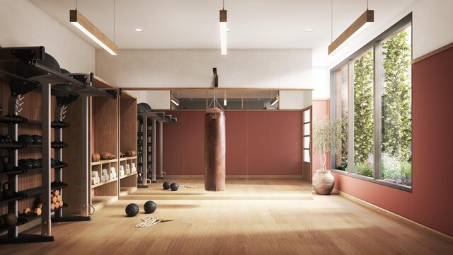 323 Bergen St Unit 119E, New York City, NY 11217 - workout area with wood finished floors and plenty of natural light