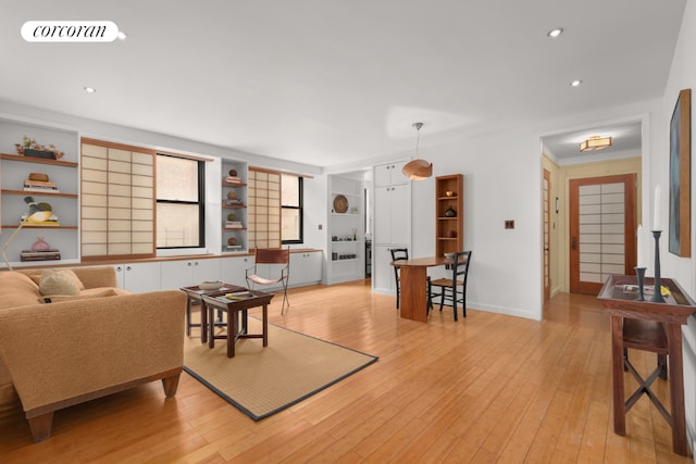 living room with light hardwood / wood-style floors