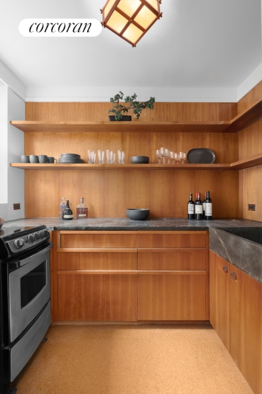 kitchen featuring stainless steel electric range oven