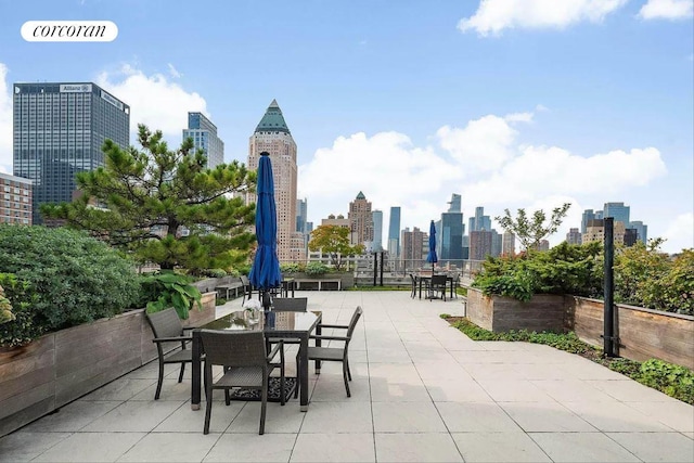 view of patio / terrace with a city view