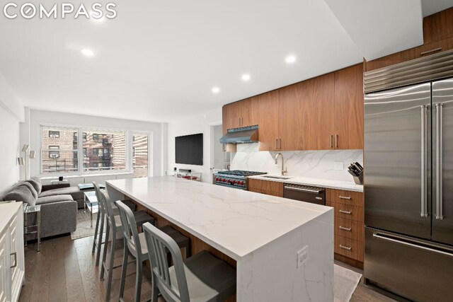 dining area with hardwood / wood-style flooring