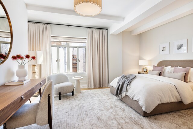 walk in closet featuring french doors and light carpet