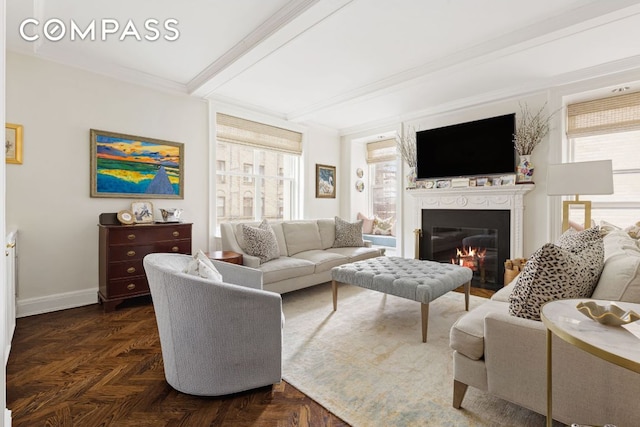 living room featuring beam ceiling, ornamental molding, and dark parquet floors