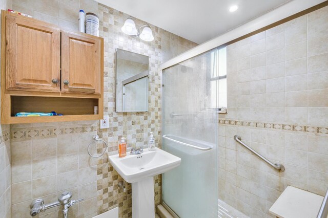 kitchen featuring stainless steel appliances and white cabinetry