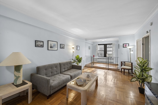 living room featuring parquet floors and crown molding