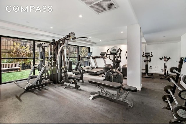 workout area with recessed lighting, visible vents, and baseboards