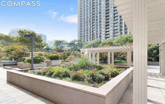 view of property's community featuring a pergola