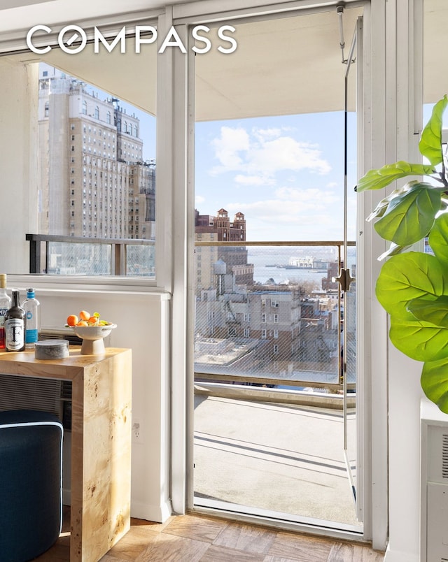 doorway to outside featuring a view of city