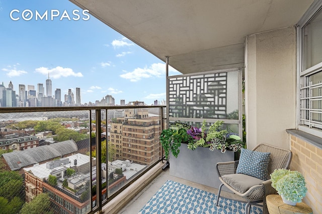 balcony featuring a city view