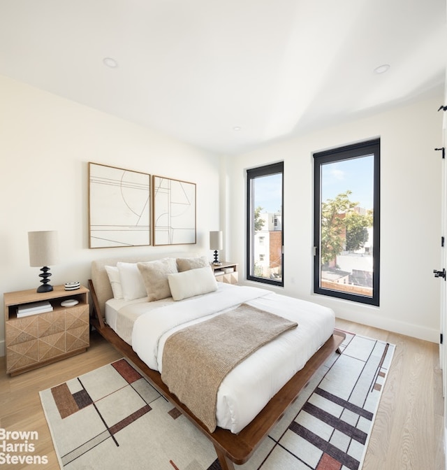 bedroom featuring light hardwood / wood-style floors